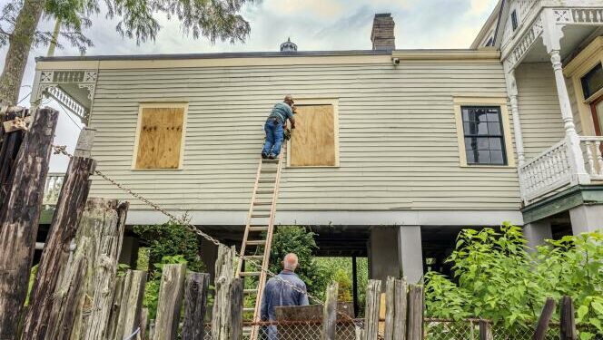 The windows of a raised historic house are boarded up as residents prepare for the arrival of Hurricane Francine along the Louisiana coast on Sept. 9, 2024, in Lafitte, Louisiana.