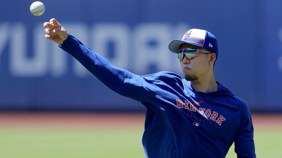 New York Mets injured starting pitcher Kodai Senga (34) throws a baseball in the outfield before a game against the Arizona Diamondbacks at Citi Field