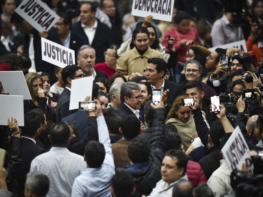 Lawmaker Ricardo Monreal celebrates after the approval of the judicial reform during a session at an alternate seat of the Mexican Congress in Mexico City's Sala de Armas, on Sept. 4.