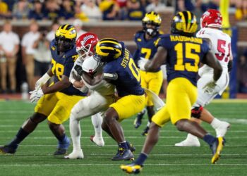 Michigan edge rusher Josaiah Stewart (0) tackles Fresno State running back Malik Sherrod (2) during the second half at Michigan Stadium in Ann Arbor on Saturday, Aug. 31, 2024.