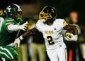 Detroit King running back Michael Dukes (2) runs against Cass Tech during the first half at Cass Tech High School in Detroit on Friday, Sept. 20, 2024.