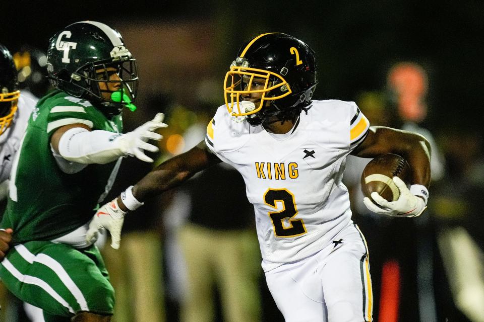 Detroit King running back Michael Dukes (2) runs against Cass Tech during the first half at Cass Tech High School in Detroit on Friday, Sept. 20, 2024.