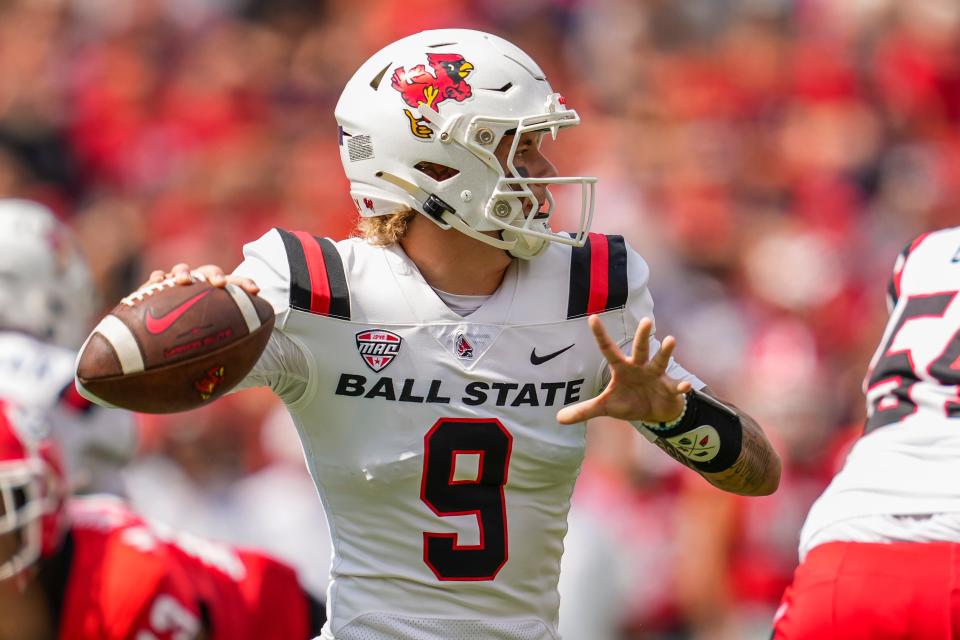 Sep 9, 2023; Athens, Georgia, USA; Ball State Cardinals quarterback Kadin Semonza (9) passes the ball against the Georgia Bulldogs during the first half at Sanford Stadium.