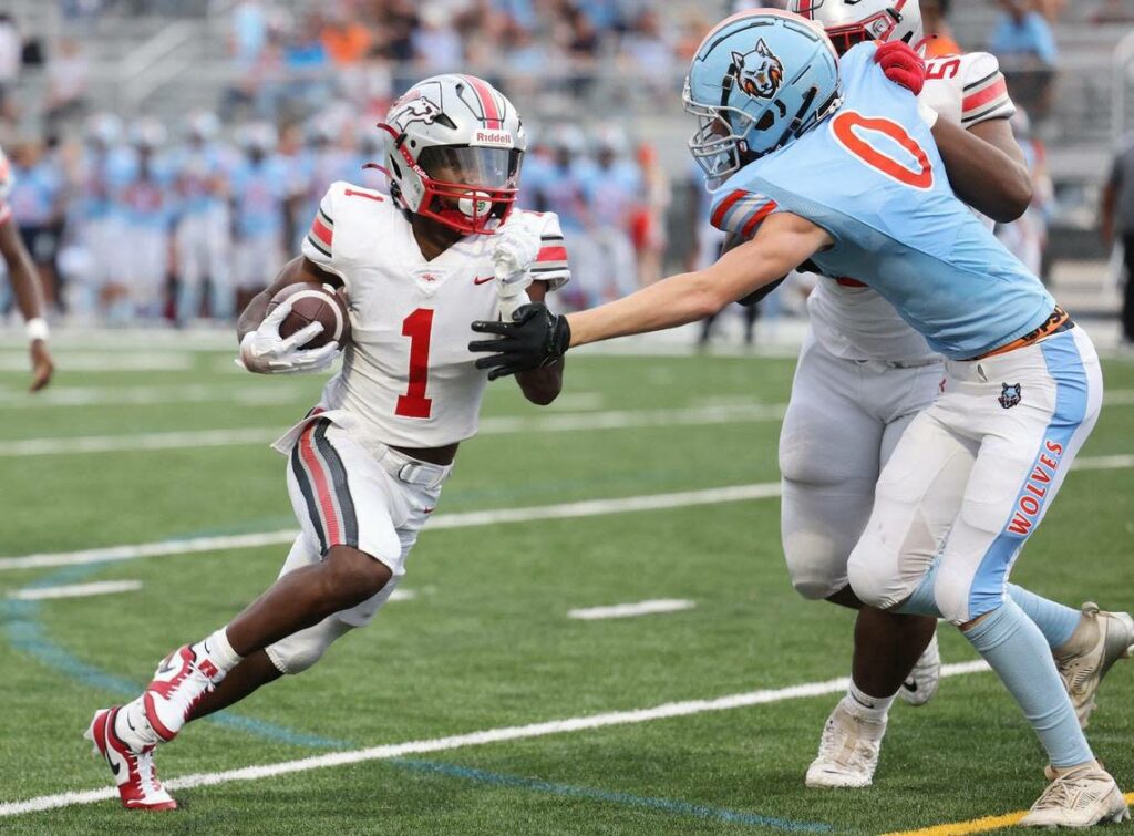 South Pointe’s Mason Pickett-Hicks carries the ball Friday as the Stallions take on the Ballantyne Ridge Wolves in Charlotte.