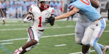 South Pointe’s Mason Pickett-Hicks carries the ball Friday as the Stallions take on the Ballantyne Ridge Wolves in Charlotte.