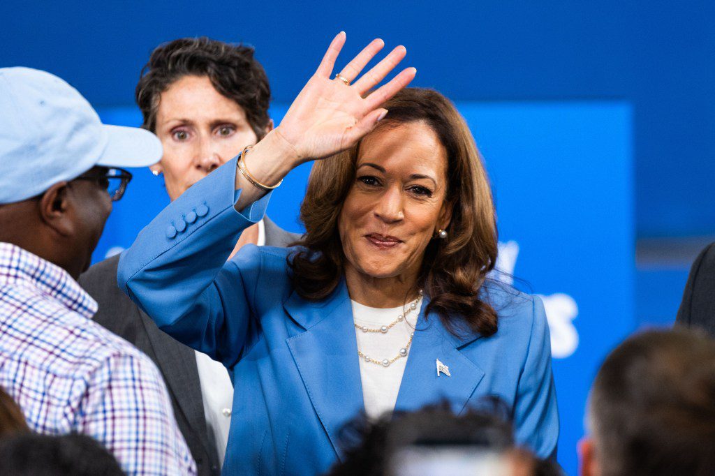 US Vice President Kamala Harris waving to supporters after delivering a speech on her economic policy at the Hendrick Center for Automotive Excellence, Raleigh, North Carolina, 16 August 2024