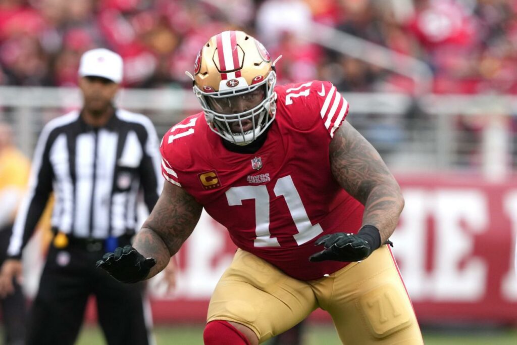 Jan 8, 2023; Santa Clara, California, USA; San Francisco 49ers offensive tackle Trent Williams (71) blocks against the Arizona Cardinals during the second quarter at Levi's Stadium. Mandatory Credit: Darren Yamashita-USA TODAY Sports