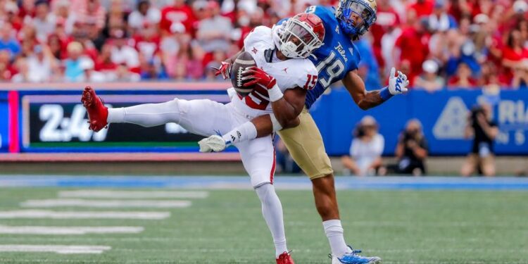 Sep 16, 2023; Tulsa, Oklahoma, USA; OklahomaÕs Kendel Dolby (15) intercepts the ball in the first quarter against the Tulsa Golden Hurricane at Skelly Field at H.A. Chapman Stadium. Mandatory Credit: Nathan J. Fish-USA TODAY Sports