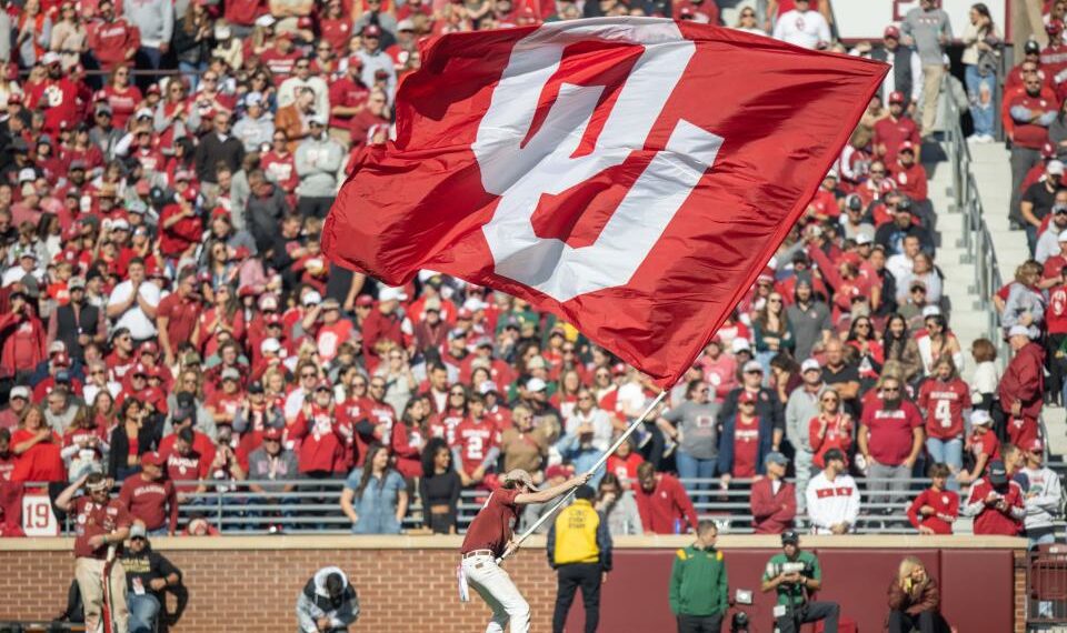 An OU flag is flown during a college football game between the University of Oklahoma Sooners (OU) and the Baylor Bears at Gaylord Family - Oklahoma Memorial Stadium in Norman, Okla., Saturday, Nov. 5, 2022. Nathan Fish, The Oklahoman