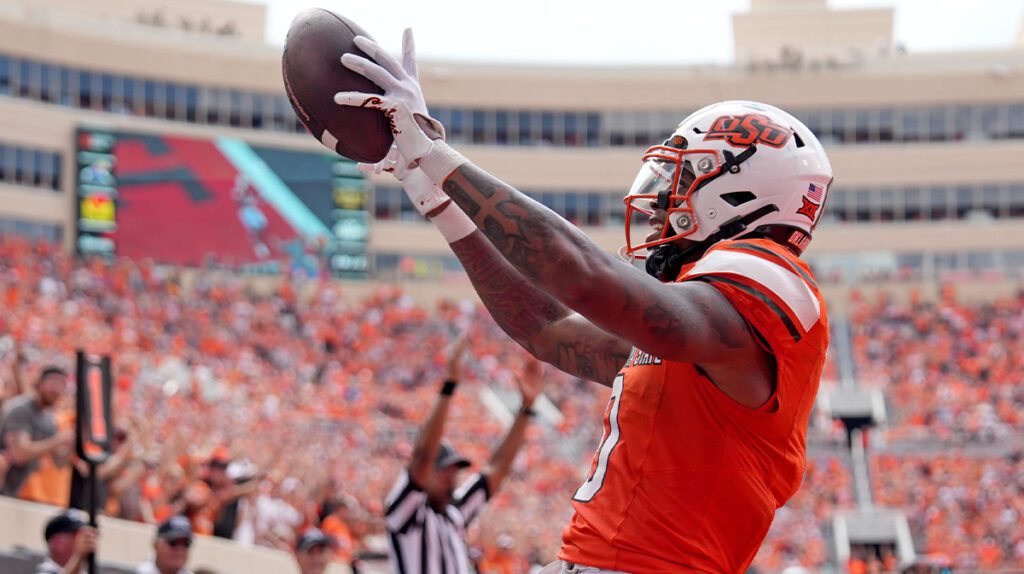 Oklahoma State's Ollie Gordon II (0) celebrates his touchdown in the second half of the college football game between the Oklahoma State Cowboys and South Dakota State Jackrabbits at Boone Pickens Stadium