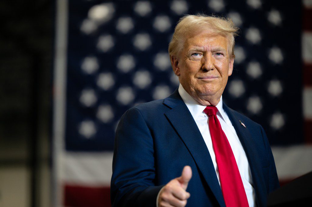 Former U.S. President Donald Trump, the Republican presidential nominee, giving a thumbs up as he arrives for a campaign rally at the Mosack Group warehouse in Mint Hill, North Carolina