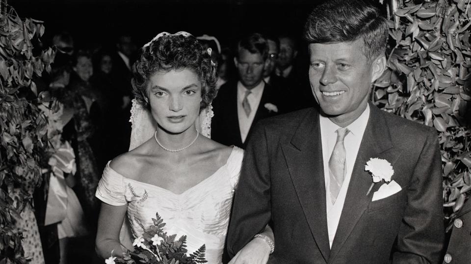 Jackie Kennedy in her bridal gown getting married to JFK