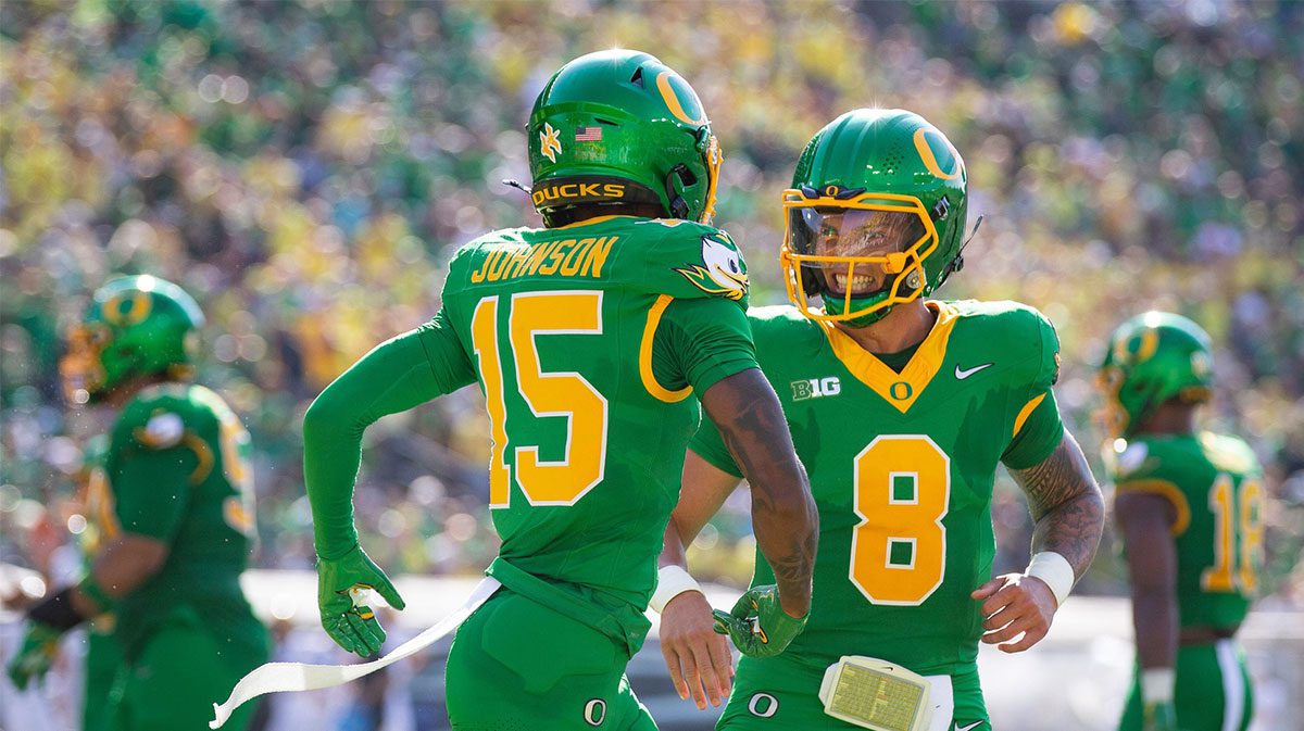 Oregon Ducks quarterback Dillon Gabriel and Oregon Ducks wide receiver Tez Johnson celebrate a touchdown by Johnson as the Oregon Ducks host the Idaho Vandals Saturday, Aug. 31, 2024 at Autzen Stadium in Eugene, Ore.