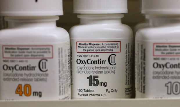 overdose deaths. Bottles of Purdue Pharma L.P. OxyContin medication sit on a pharmacy shelf in Prov...