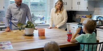 Kaitlyn Kash and her husband, Cory, at home with their two children.