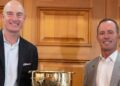 2024 Presidents Cup captains Mike Weir, right, for the international team, and Jim Furyk, for the U.S. team, pose for photos Tuesday, Sept. 12, 2023, at Royal Montreal Golf Club in Ile-Bizard, Quebec. (Ryan Remiorz/The Canadian Press via AP)