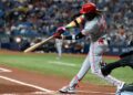 Cincinnati Reds shortstop Elly De La Cruz (44) flies out against the Tampa Bay Rays during the first inning at Tropicana Field.