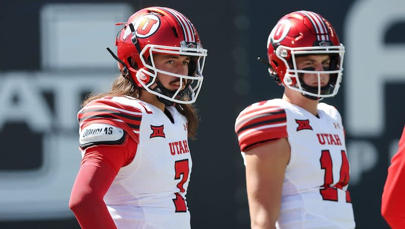 Utah Utes quarterback Cameron Rising (7) and Utah Utes quarterback Sam Huard (14) watch warm ups agaistn USU in Logan on Saturday, Sept. 14, 2024.