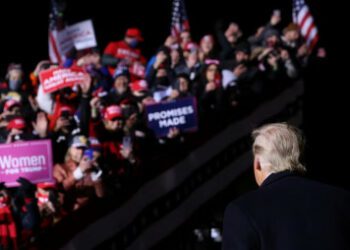 Then US President Donald Trump looks back at his supporters in this file photo, as he departs at the end of a campaign event at Eppley Airfield in Omaha, Nebraska, U.S. October 27, 2020. Photo: REUTERS/Jonathan Ernst/File Photo