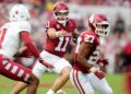 Oklahoma quarterback Jackson Arnold (11) keeps the ball and runs in the first half of an NCAA football game between Oklahoma (OU) and Temple at the Gaylord Family Oklahoma Memorial Stadium in Norman, Okla., on Friday, Aug. 30, 2024.