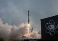 Rocket Lab's Electron rocket taking off from its launch complex.