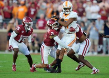 Oklahoma Sooners defensive back Billy Bowman Jr. (2) brings down Tennessee Volunteers wide receiver Chris Brazzell II (17) during a college football game between the University of Oklahoma Sooners (OU) and the Tennessee Volunteers at Gaylord Family - Oklahoma Memorial Stadium in Norman, Okla., Saturday, Sept. 21, 2024.