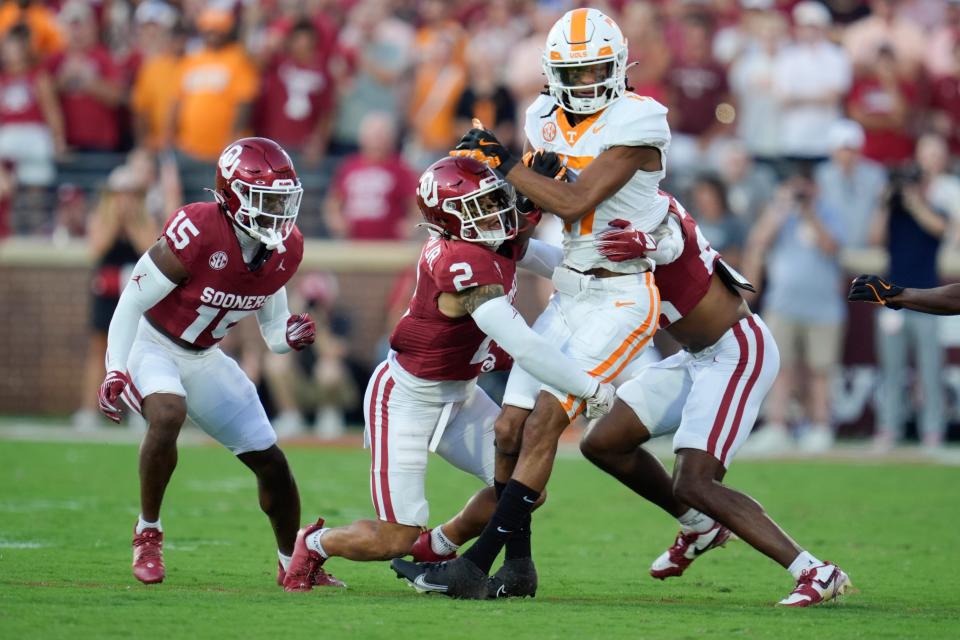 Oklahoma Sooners defensive back Billy Bowman Jr. (2) brings down Tennessee Volunteers wide receiver Chris Brazzell II (17) during a college football game between the University of Oklahoma Sooners (OU) and the Tennessee Volunteers at Gaylord Family - Oklahoma Memorial Stadium in Norman, Okla., Saturday, Sept. 21, 2024.