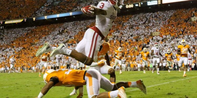 Sep 12, 2015; Knoxville, TN, USA; Oklahoma Sooners wide receiver Sterling Shepard (3) scores the winning touchdown in double overtime against the Tennessee Volunteers Neyland Stadium. Oklahoma won in double overtime 31-24. Randy Sartin-USA TODAY Sports