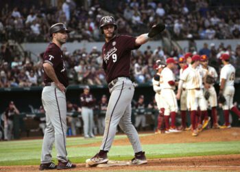 Mar 2, 2024; Arlington, TX, USA; Texas A&M Aggies compete against University of Southern California Trojans during the Kubota College Baseball Series - Weekend 3 at Globe Life Field. Mandatory Credit: Dustin Safranek-USA TODAY Sports