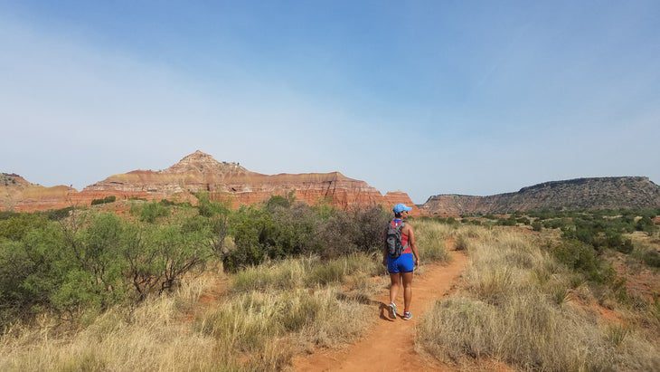 woman hiking at Palo Duro Canyon State Park