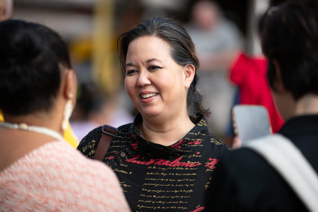 U.S. Rep. Jill Tokuda attended the paddle-out event in Lahaina on Aug. 8, 2024, to mark one year since the Maui fires. (Nathan Eagle/Civil Beat/2024)