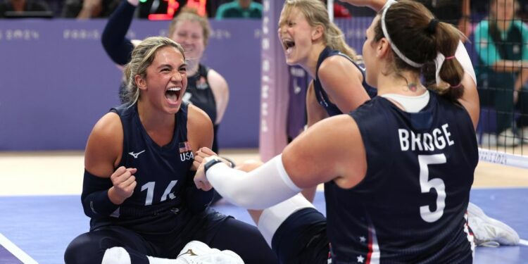 Team USA celebrates against China during the women's sitting volleyball competition.