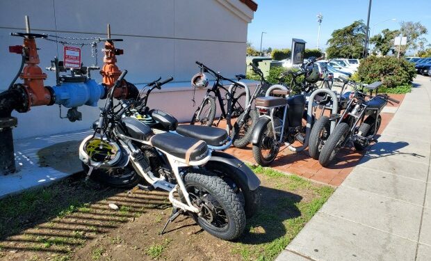 E-bikes often are parked outside La Jolla High School. (Ashley Mackin-Solomon)