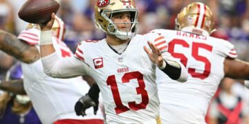 Sep 15, 2024; Minneapolis, Minnesota, USA; San Francisco 49ers quarterback Brock Purdy (13) throws a pass against the Minnesota Vikings during the first quarter U.S. Bank Stadium. Mandatory Credit: Jeffrey Becker-Imagn Images