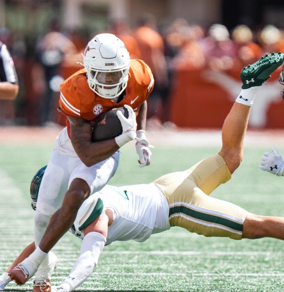 Texas running back Jaydon Blue will try anbd find room to run against a rugged Michigan defense. The Longhorns' ability to run power between the tackles could prove decisive in Saturday's game at Michigan.