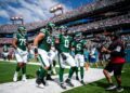 New York Jets running back Braelon Allen (0) celebrates his touchdown against the Tennessee Titans during the second quarter at Nissan Stadium in Nashville, Tenn., Sunday, Sept. 15, 2024.