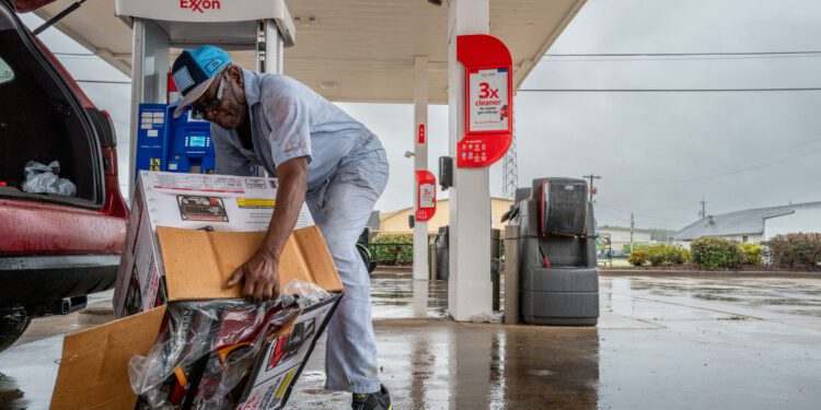 Porkchop Singleton, 78, prepares his generator ahead of Hurricane Francine in Morgan City, Louisiana