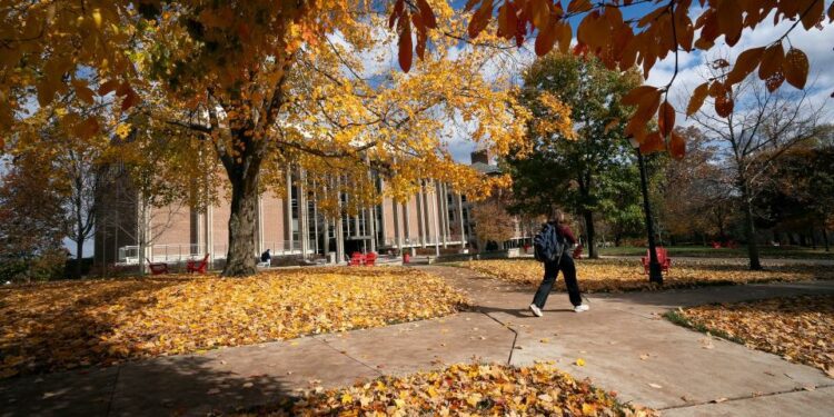 Oct 31, 2023; Granville, Ohio, USA; Mia Hennum walks on the Denison University campus.