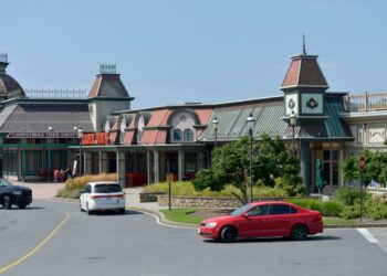 Trader Joe's in Hyannis in July. Officials have signed a 10-year lease to stay in this Iyannough Road location next to the former Christmas Tree Shops and will be expanding.