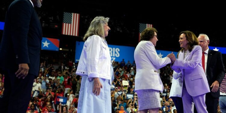 Tim Walz and Kamala Harris greet Sen. Jacky Rosen, D-Nev., Rep. Dina Titus, D-Nev., and Rep. Steven Horsford, D-Nev., at a campaign rally on Aug. 10, 2024, in Las Vegas.