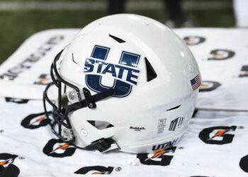 Sep 4, 2021; Pullman, Washington, USA; Utah State Aggies helmet sits during a game against the Washington State Cougars in the second half at Gesa Field at Martin Stadium. The Aggies26-23. Mandatory Credit: James Snook-USA TODAY Sports