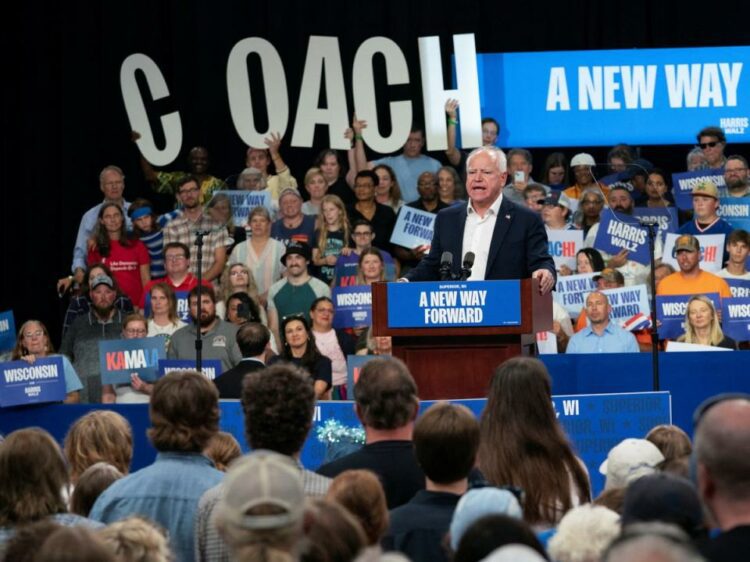 Democratic vice presidential nominee, Minnesota Governor Tim Walz, delivers remarks at an election campaign event in Superior, Wisconsin, on September 14, 2024 (REUTERS)