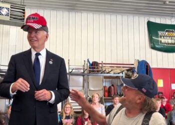 Watch Biden Rub Elbows With Trump Supporter In MAGA Hat