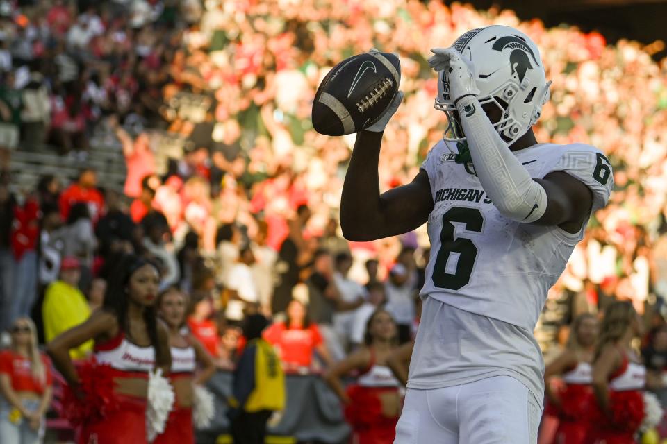 Sep 7, 2024; College Park, Maryland, USA; *Michigan State Spartans wide receiver Nick Marsh (6) celebrates after scoring a touchdown during the second half against the Maryland Terrapins at SECU Stadium. Mandatory Credit: Tommy Gilligan-Imagn Images