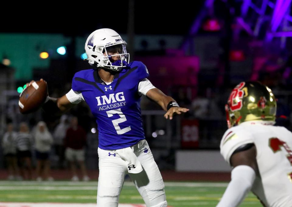 IMG Academy's Ty Hawkins (2) passes the ball during the third quarter of the Battle at the Beach football game against Bergen Catholic at Carey Stadium in Ocean City, N.J., Thursday, Aug. 29, 2024.