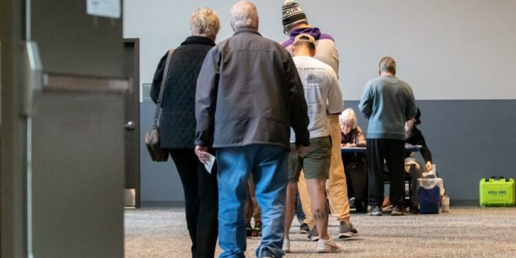 Voters wait in line at Covenant Church in Buckingham during last year's Election Day on Tuesday, Nov. 7, 2023.