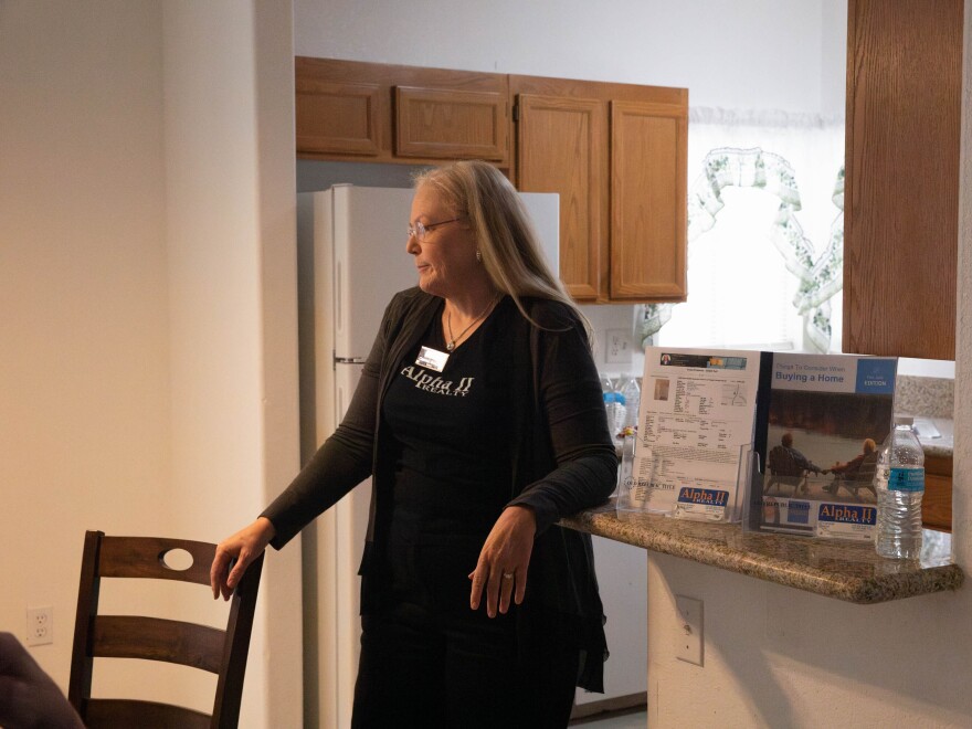 Real Estate agent Cristine Bullard waits for potential homebuyers inside an Open House in Las Vegas, Nevada, on Sept. 20, 2024.