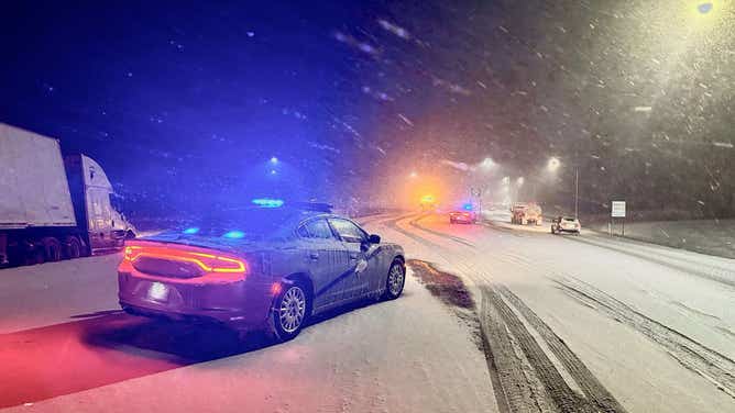 A captured image featuring a heavily snow-covered highway during Tuesday’s winter storm.